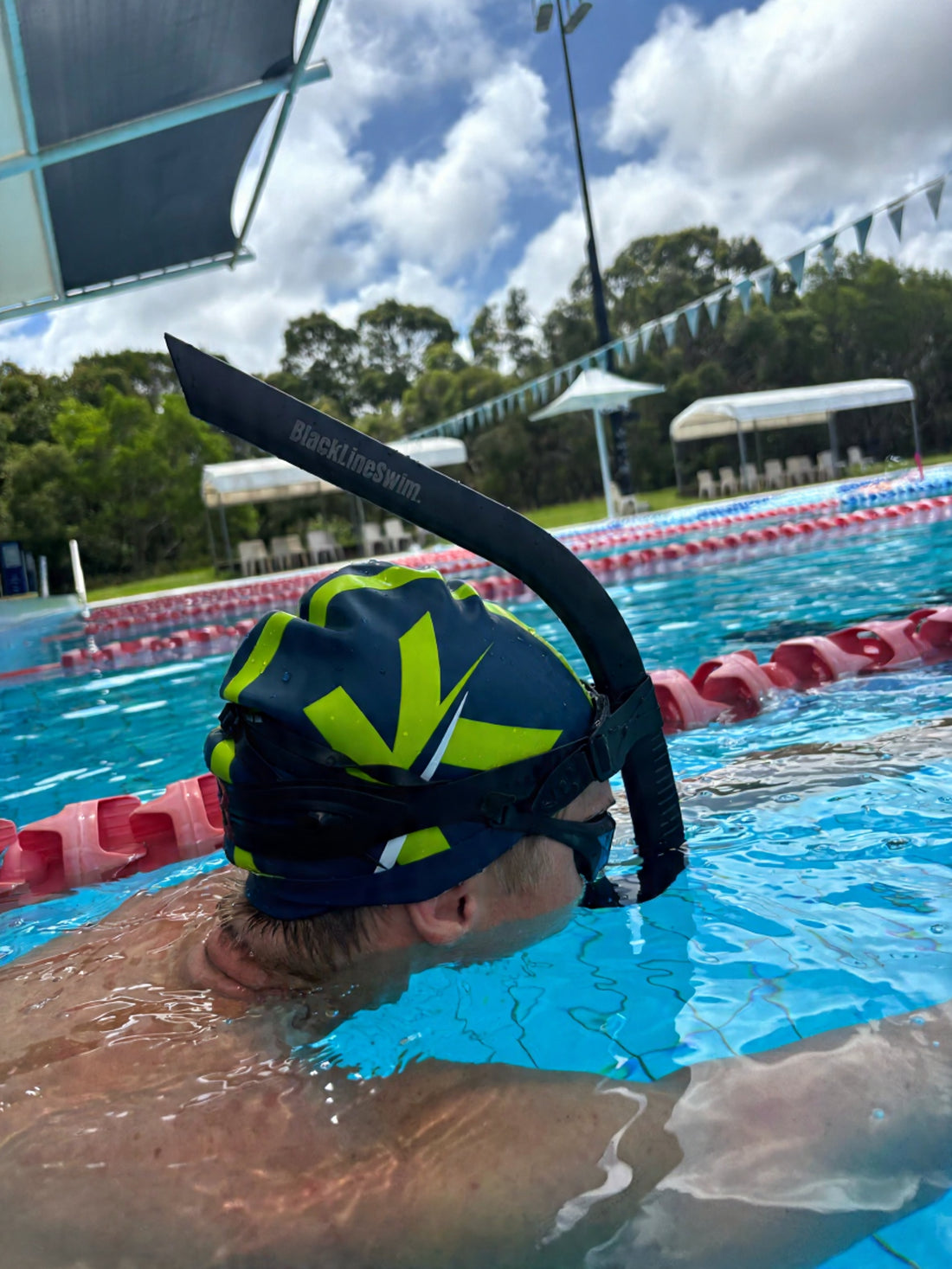 Swimmer using a BlackLine hypoxic snorkel during freestyle training